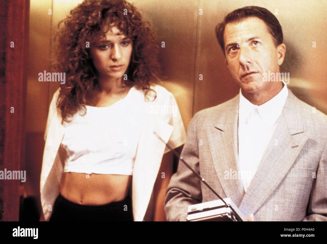 Titre original : RAIN MAN. Titre en anglais : RAIN MAN. Film Réalisateur : Barry Levinson. Année : 1988. Stars : Dustin Hoffman ; VALERIA GOLINO. Credit : United Artists / Album Banque D'Images