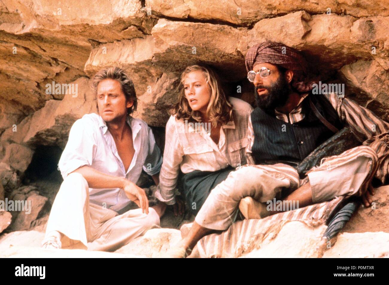 Film Original Titre : LE JOYAU DU NIL. Titre en anglais : LE JOYAU DU NIL. Directeur de film : LEWIS TEAGUE. Année : 1985. Stars : Kathleen Turner, MICHAEL DOUGLAS, AVNER EISENBERG. Crédit : 20TH CENTURY FOX / Album Banque D'Images