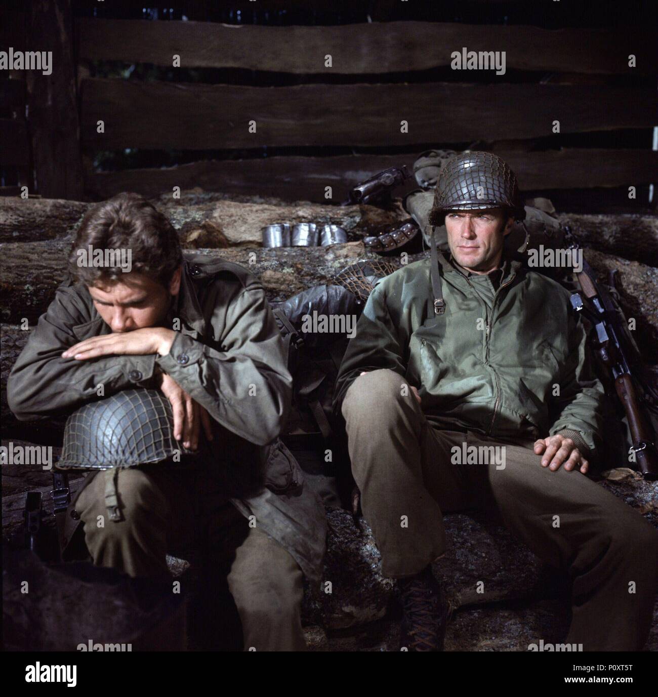 Titre original : KELLY'S HEROES. Titre en anglais : KELLY'S HEROES. Réalisateur : Brian G. HUTTON. Année : 1970. Stars : CLINT EASTWOOD. Credit : M.G.M / Album Banque D'Images