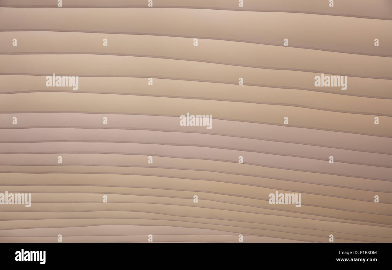 Dunes de sable, la forme et la couleur, texture background.Beige toit textile pour la protection solaire, vague Banque D'Images
