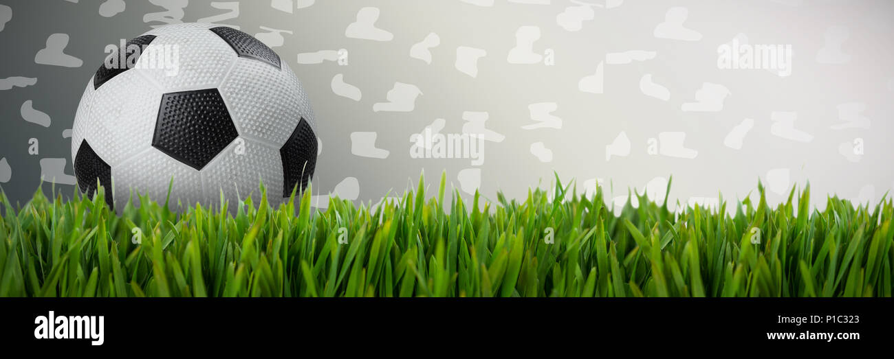 Image composite de football en cuir noir et blanc Banque D'Images