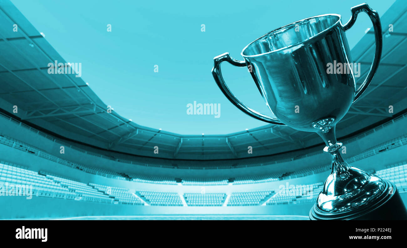 Blue theme trophy avec arrière-plan flou football stadium Banque D'Images