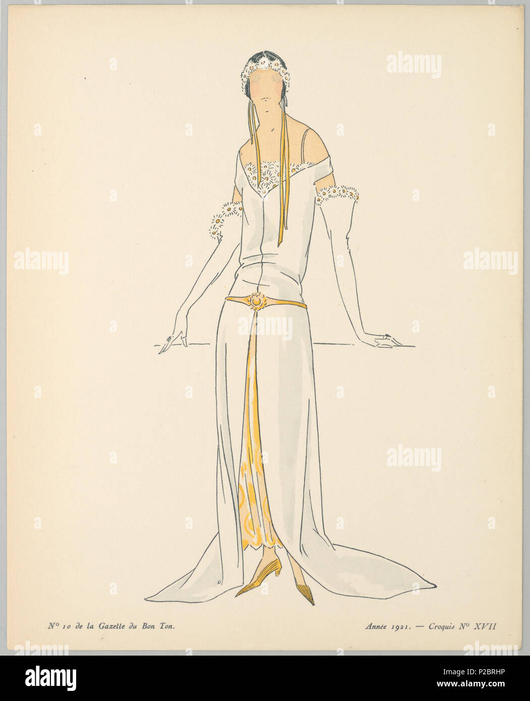 Anglais Print France 1921 Anglais Centre femme pose en blanc de l epaule robe taille basse sous couche jaune eith vu a travers la jupe fendue. Elle porte un bandeau