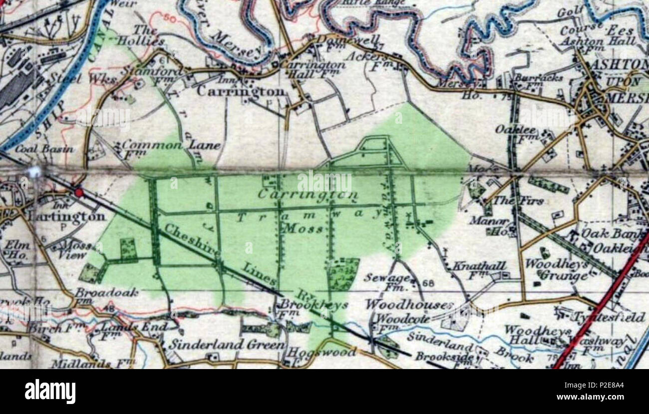 . Anglais : Le centre map est Bolton et Manchester, Angleterre et Pays de Galles populaires (4e) édition. Publié en 1937. Basé sur 1924 la cartographie. Offert par Joyce Whitchurch. Frontière verte prises à partir de la page 17 de Nicholls, Robert (1985) le chemin de fer à voie étroite : Chat Moss et Carrington Estates, Narrow Gauge Railway Society, ISBN 0950716928 recadrée pour voir Carrington Moss. 1937. L'Ordnance Survey map 1937 moss Carrington 11 Banque D'Images