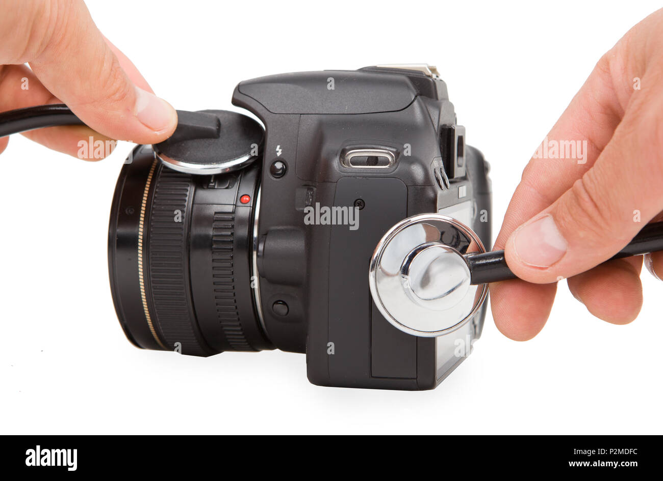 Réparation de l'appareil photo avec stéthoscope. Service de l'équipement photographique. Banque D'Images