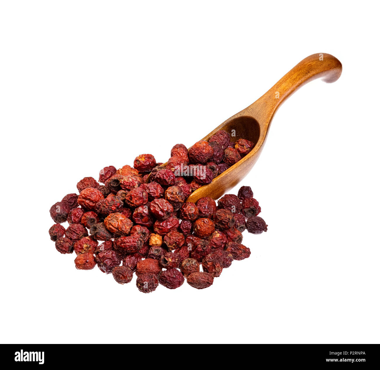 Crataegus Aestivalis berries on la cuillère en bois. Banque D'Images