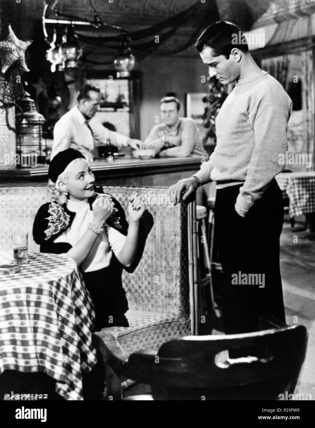 Titre original : LE CUIR SAINT. Titre en anglais : LE CUIR SAINT. Directeur de film : ALVIN GANZER. Année : 1956. Stars : John DEREK. Credit : PARAMOUNT PICTURES / Album Banque D'Images