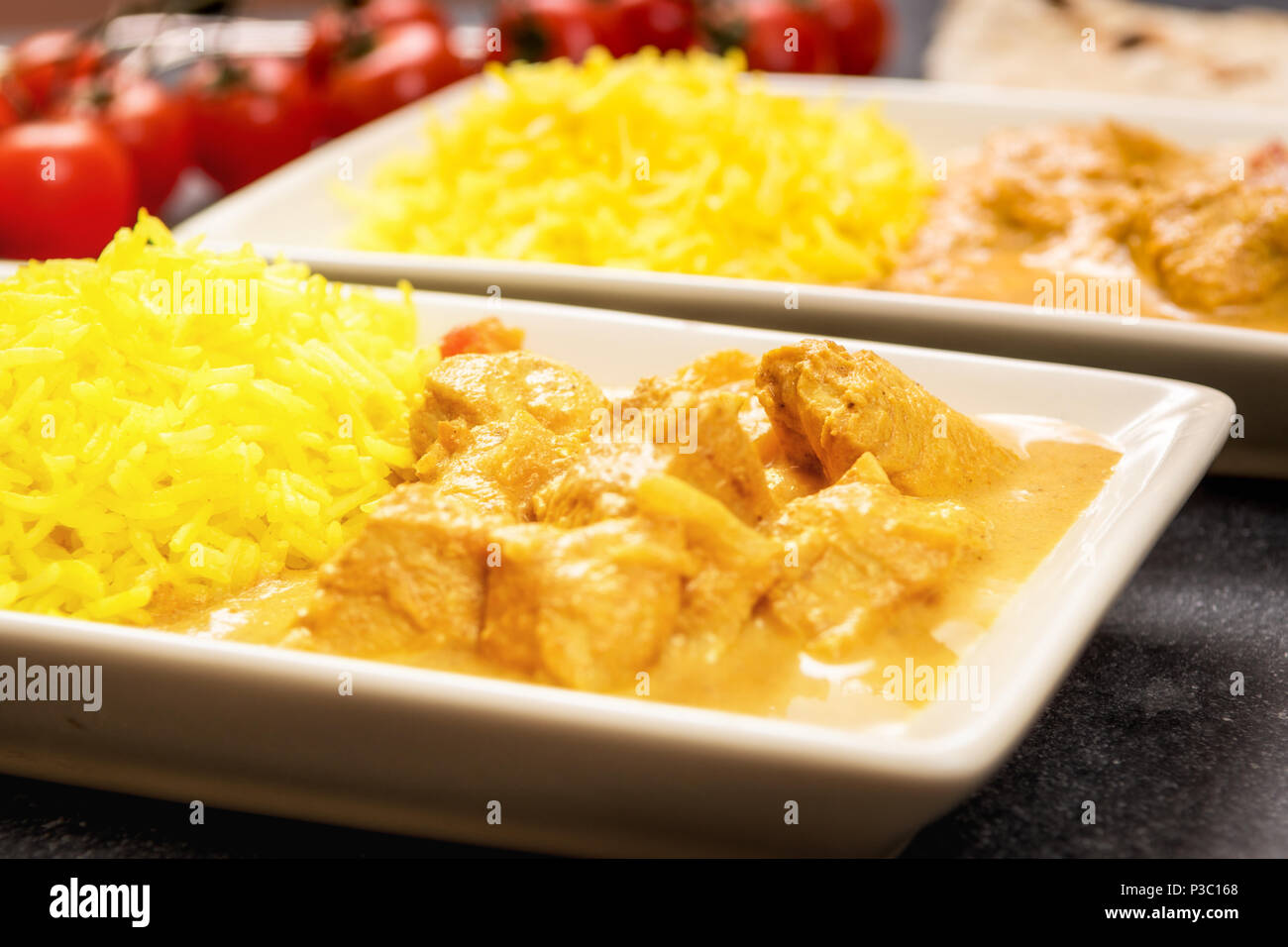 Beurre masala poulet avec riz au jasmin et chapati Banque D'Images