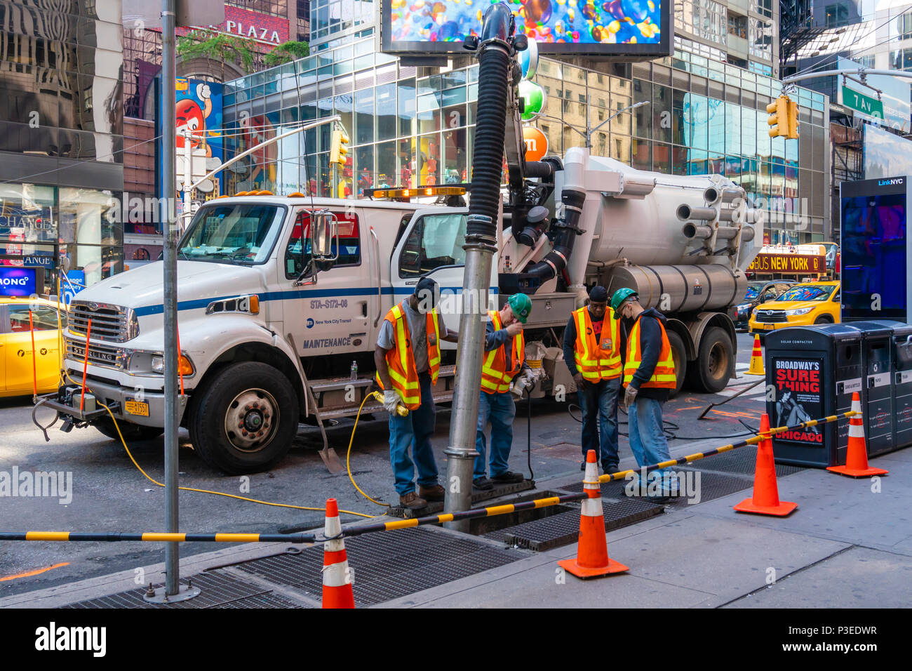 Égouts nettoyage travailleurs Banque D'Images