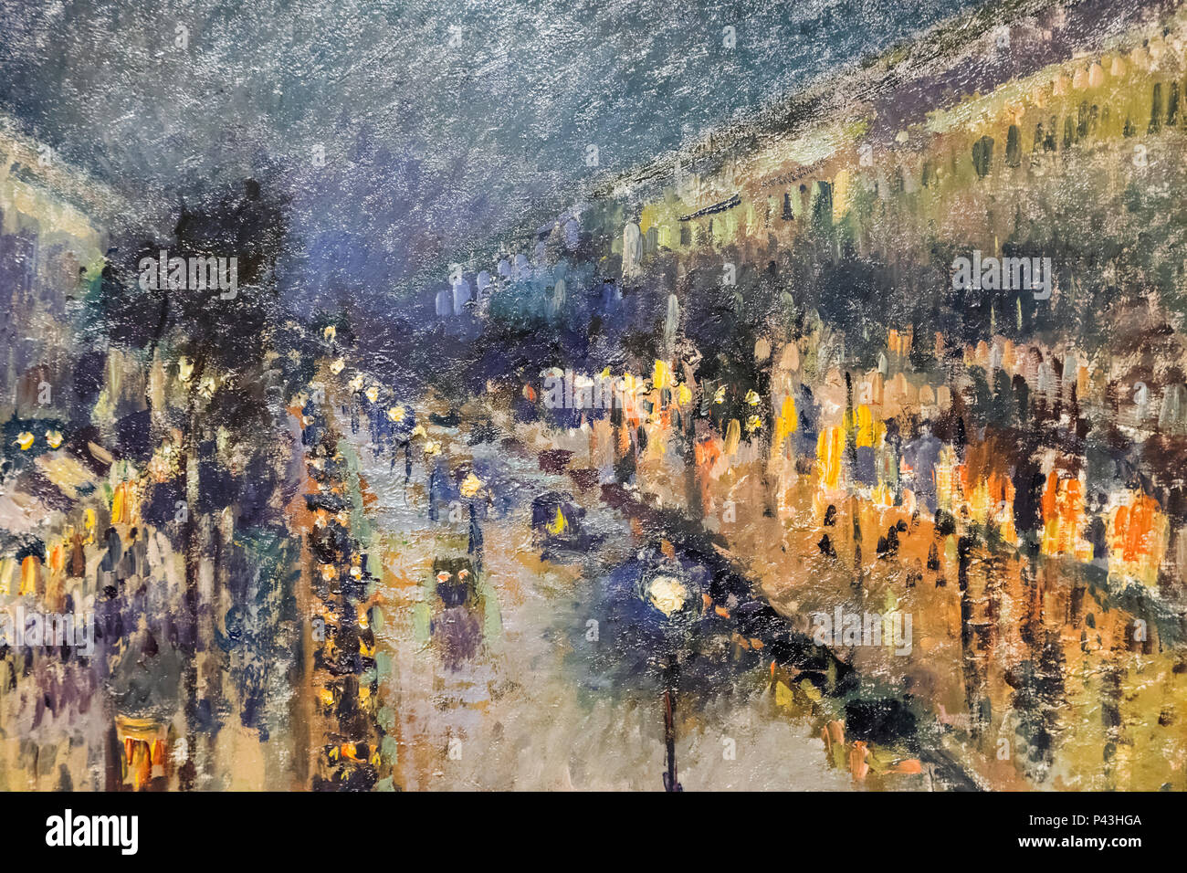 La peinture intitulée 'Le Boulevard Montmartre la nuit' de Camille Pissarro daté 1877 Banque D'Images