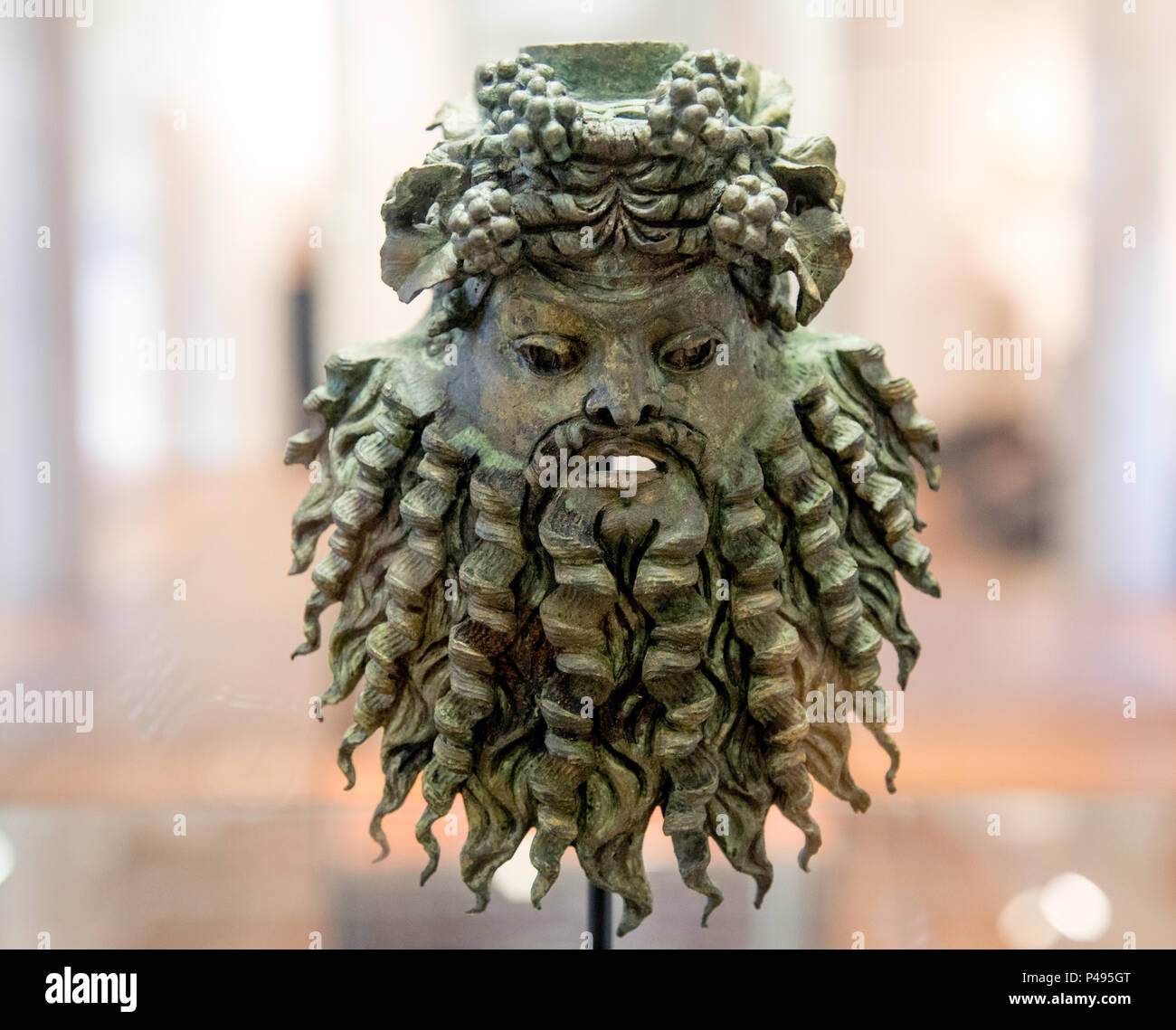Petite tête en bronze de Bacchus Musée Archéologique Nice France Banque D'Images