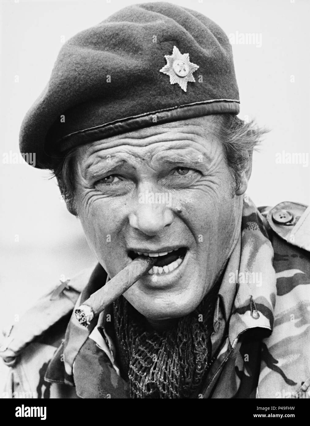 Film Original Titre : L'Oie Sauvage. Titre en anglais : The Wild Geese. Directeur de film : Andrew C. MCLAGLEN. Année : 1978. Stars : Roger Moore. Credit : RANG / Album Banque D'Images