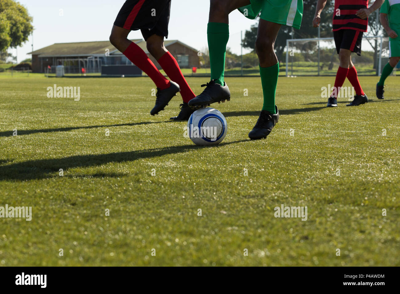 Player playing football match de football Banque D'Images