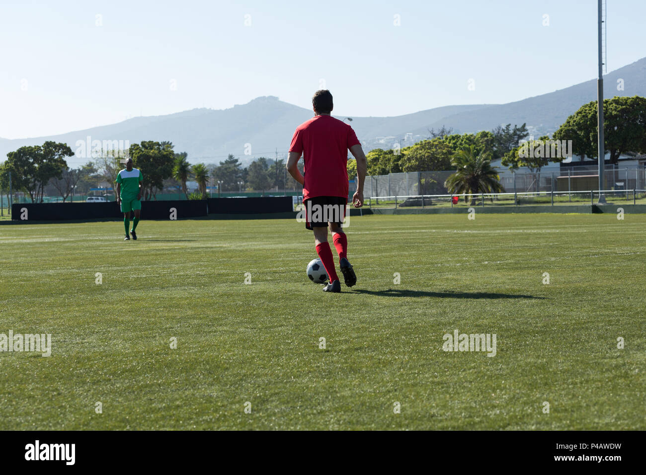 Player playing football match de football Banque D'Images