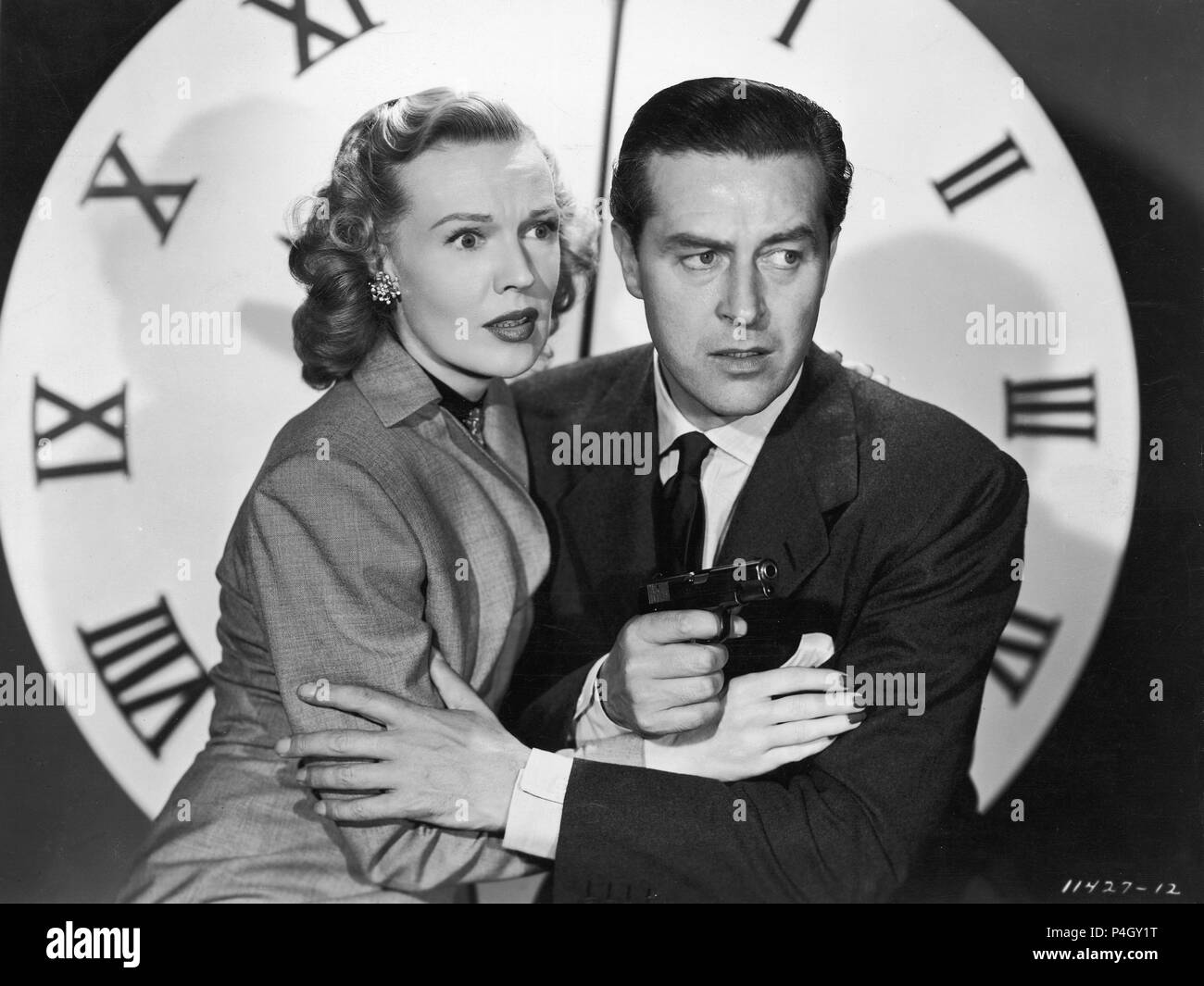Titre original : LE GRAND RÉVEIL. Titre en anglais : LA GROSSE Horloge. Film Réalisateur : John Farrow. Année : 1948. Stars : RAY MILLAND, RITA JOHNSON. Credit : PARAMOUNT PICTURES / Album Banque D'Images