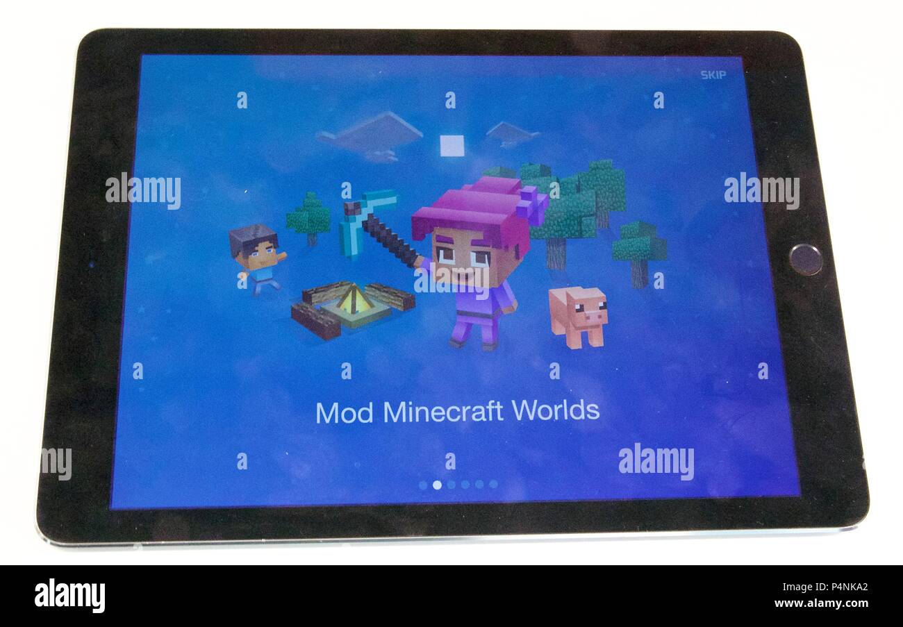 L'écran qui dit 'Mod' Mondes Minecraft pour Tynker : Codage pour les enfants app sur un iPad Air Banque D'Images