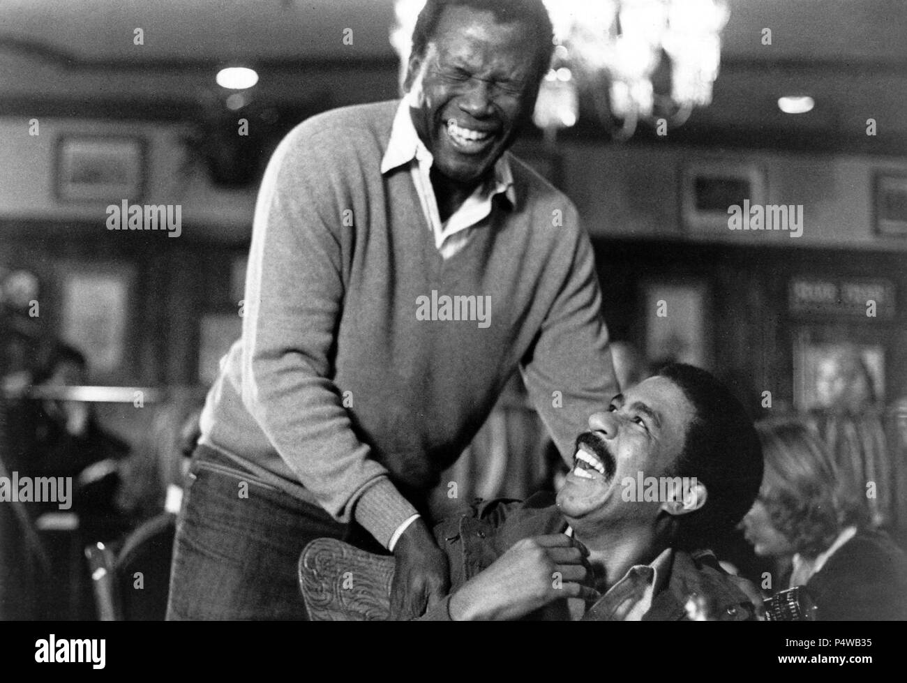 Titre original : Remuez fou. Titre en anglais : Remuez fou. Film Réalisateur : Sidney Poitier. Année : 1980. Stars : Sidney Poitier ; RICHARD PRYOR. Credit : Columbia Pictures / Album Banque D'Images