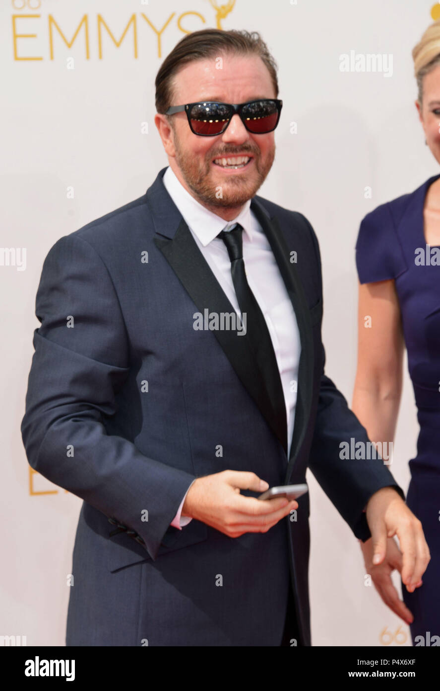 Rick Gervais with jane Fellow and Ashley Johnson and husband - Invention Of  Lying premiere at the Chinese Theatre in Los Angeles Stock Photo - Alamy