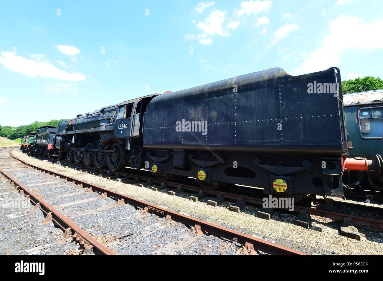 Une locomotive à vapeur 9F dans une voie de garage Banque D'Images