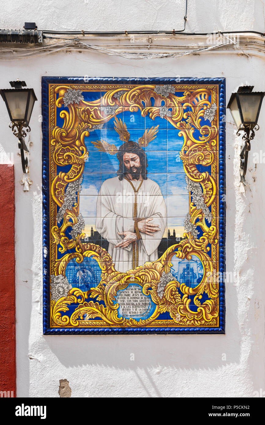 Commerce de l'Espagne, un portrait de Jésus Christ composé de tuiles azulejo situé sur un mur dans le Compas Calle de San Francisco à Cordoue, Andalousie, espagne. Banque D'Images