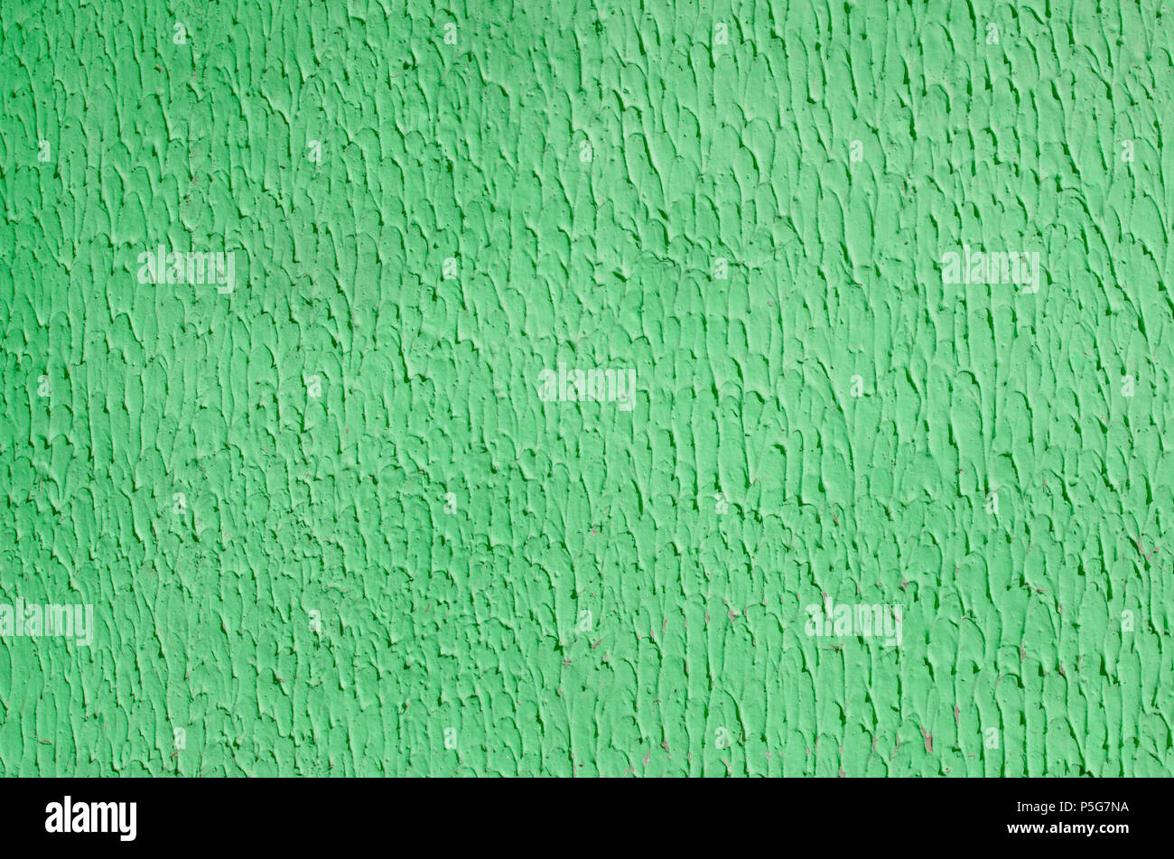 La texture du mur de plâtre vert. Fond de stuc vide. Le plâtre de couche de finition décorative Banque D'Images