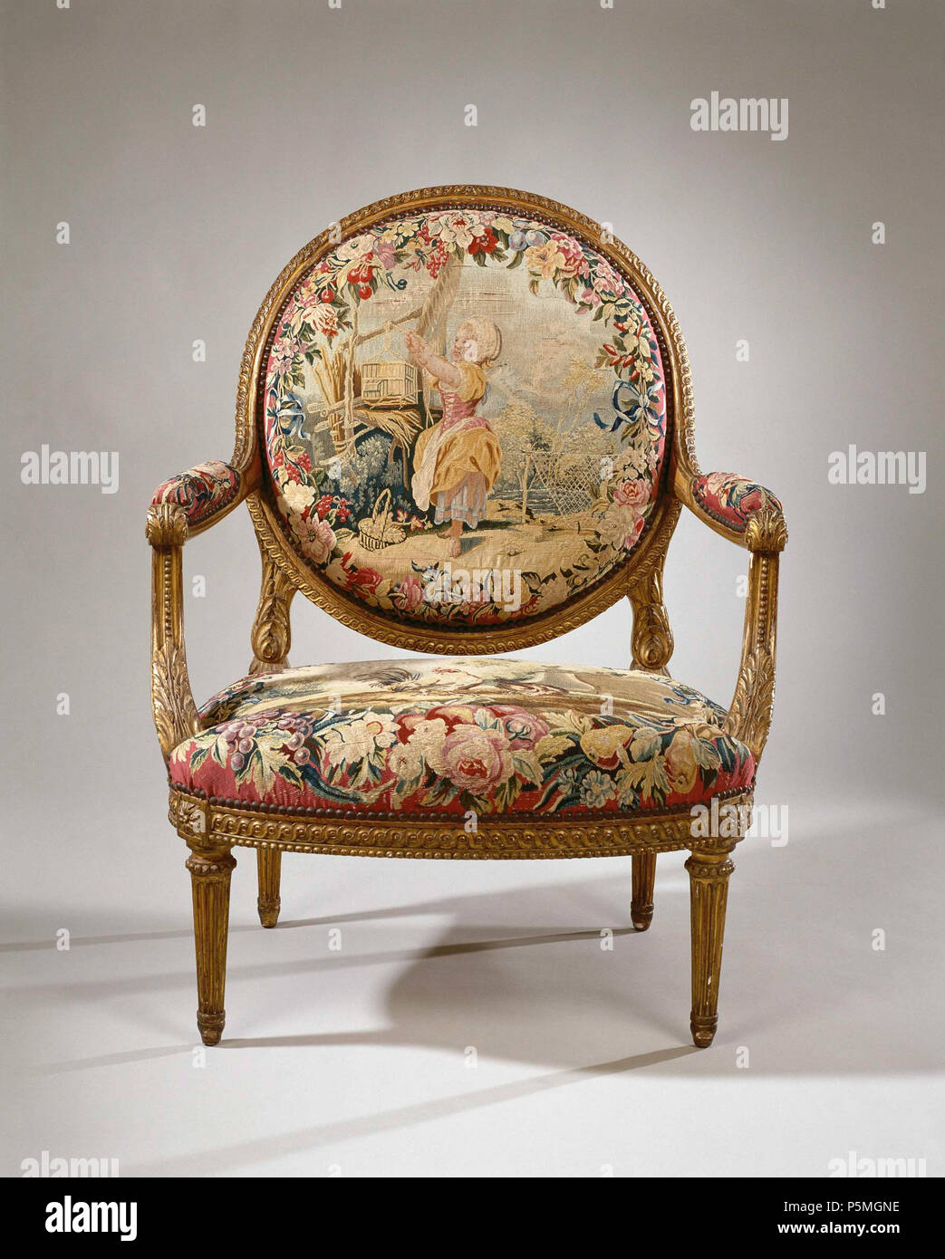 Bekleed Armstoel rencontré tapisserie met een meisje rencontré en vogelnet vogelkooi (petit oiseli) (UCL) en De Fabel van de Haan en de parel (zitting) . Van Armstoel verguld beukenhout, rustend gevormde conisch op poten. De stoel behoort tot een ameublement. Beklede zitraam op het gebogen beklede rugraam ovale en het zijn op een roze aime bien bloemenkransen aangebracht voorstellingen binnen (tapisserie de Beauvais). Zie tevens : BK-16657-a/d en f. ; zitmeubel ; stoel ; armstoel ; ameublement . 1755 - ca.1765 ; 1935 ; 1755 - ca.1765 ; 1935. N/A 128 bekleed Armstoel rencontré tapisserie met een meisje rencontré vogelkooi en vogel Banque D'Images