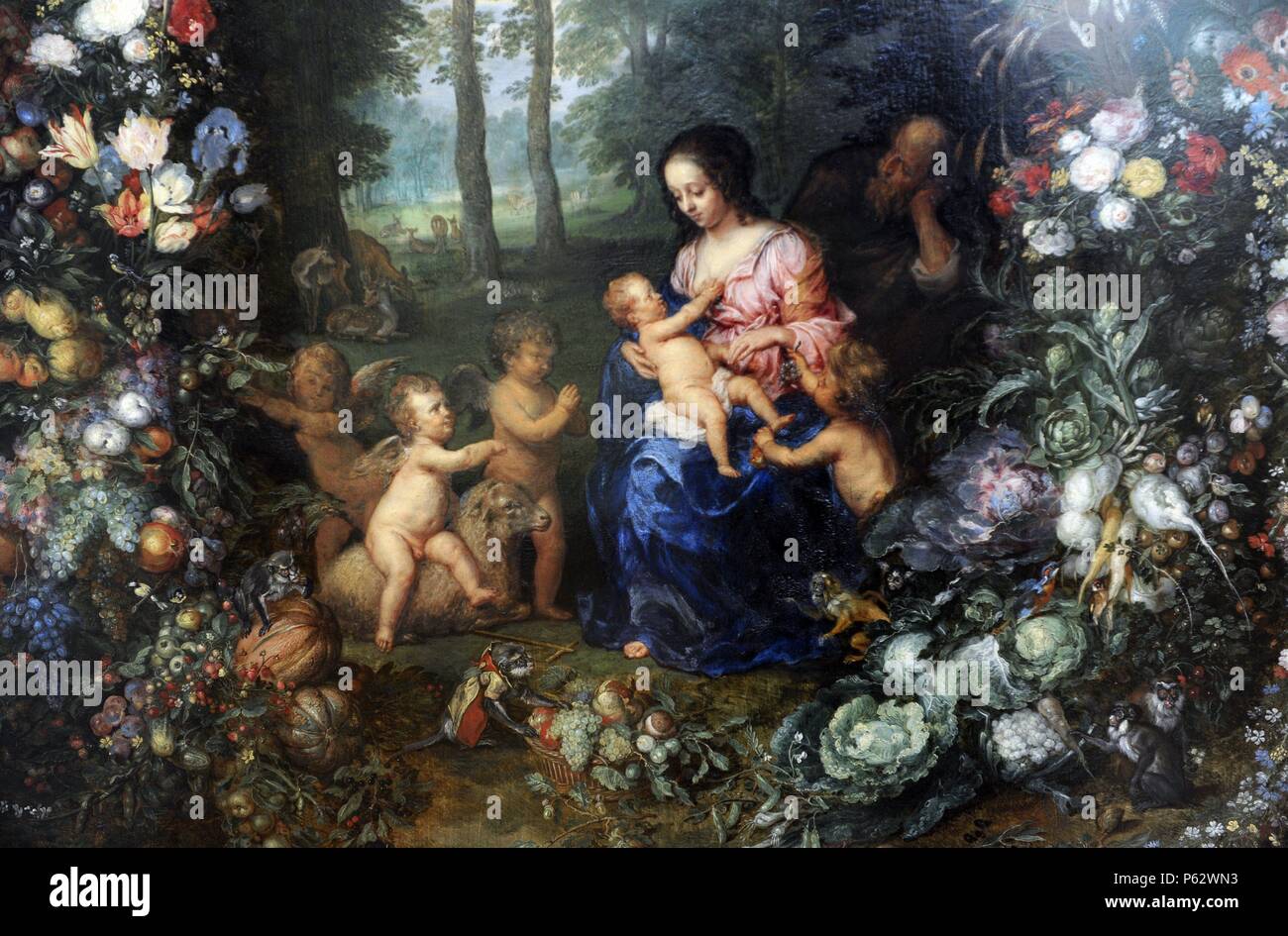 Jan Brueghel l'ancien (1568-1625) et Pieter van Avont (1600-1632). Les peintres flamands, Sainte Famille sur une guirlande de fleurs et de fruits, ca. 1620. L'Alte Pinakothek. Munich. L'Allemagne. Banque D'Images