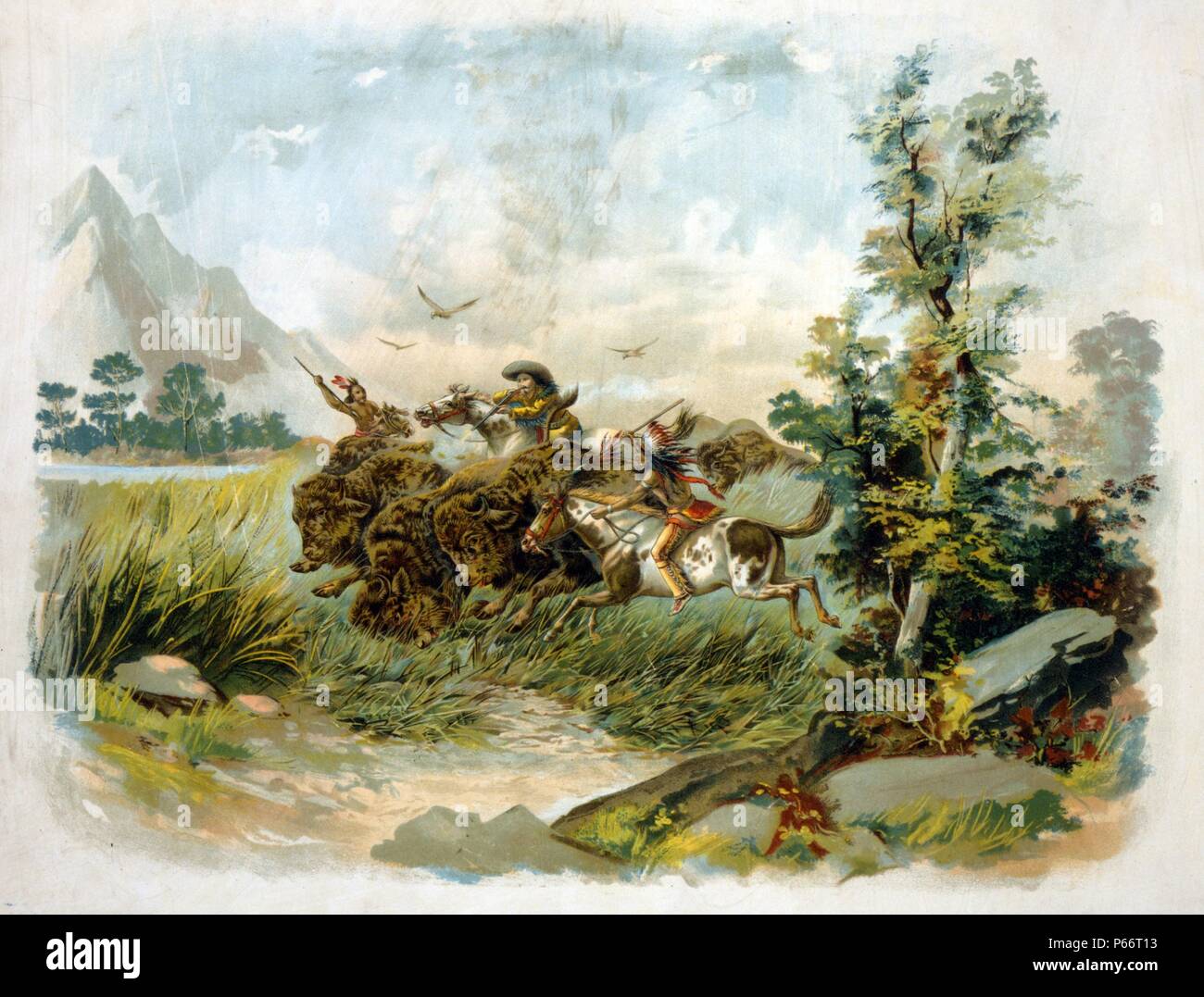 Chasse au bison dans le far west Publié 1897. Un tir d'un chasseur de bison buffalo comme deux Autochtones ride aux côtés avec des lances. Banque D'Images