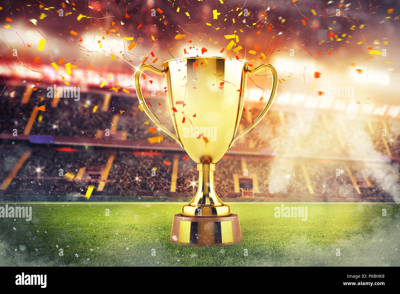 Golden winner's cup au milieu d'un stade avec audience Banque D'Images