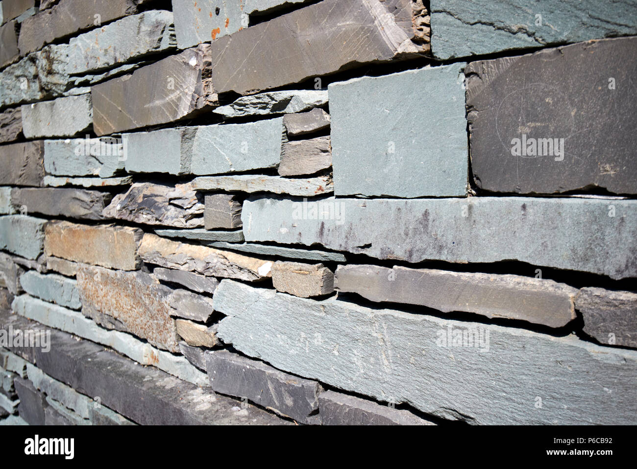 Mur du bâtiment construit en pierre de Lakeland slate construction Ambleside lake district cumbria england uk Banque D'Images