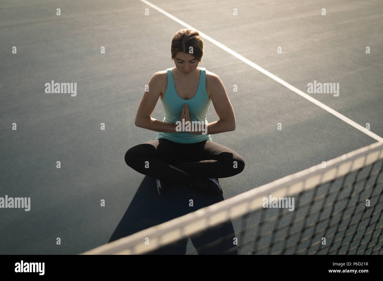 Exercice de yoga tennis Banque D'Images