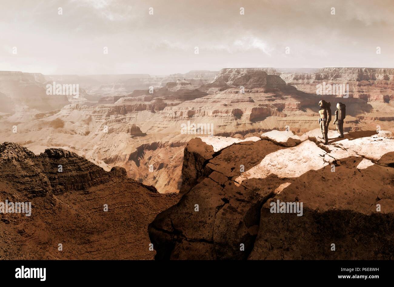 Illustration du système de canyons de Valles Marineris, Mars, l'enquête par une paire d'astronautes. Les Valles Marineris est plus de 4 000 kilomètres (km) de long, jusqu'à 200 km de large et jusqu'à 7 km de profondeur, éclipsant le Grand Canyon d'Arizona, USA. Les canyons se trouvent sur l'extrémité sud-est du renflement de Tharsis et ont été initialement créés par les failles lors de la formation de Tharsis. Les canyons ont encore été épuisées par l'érosion hydrique et éolienne. Enfin, le glissement a contribué à élargir le canyon de sorte que la partie inférieure est visible de l'espace. Banque D'Images