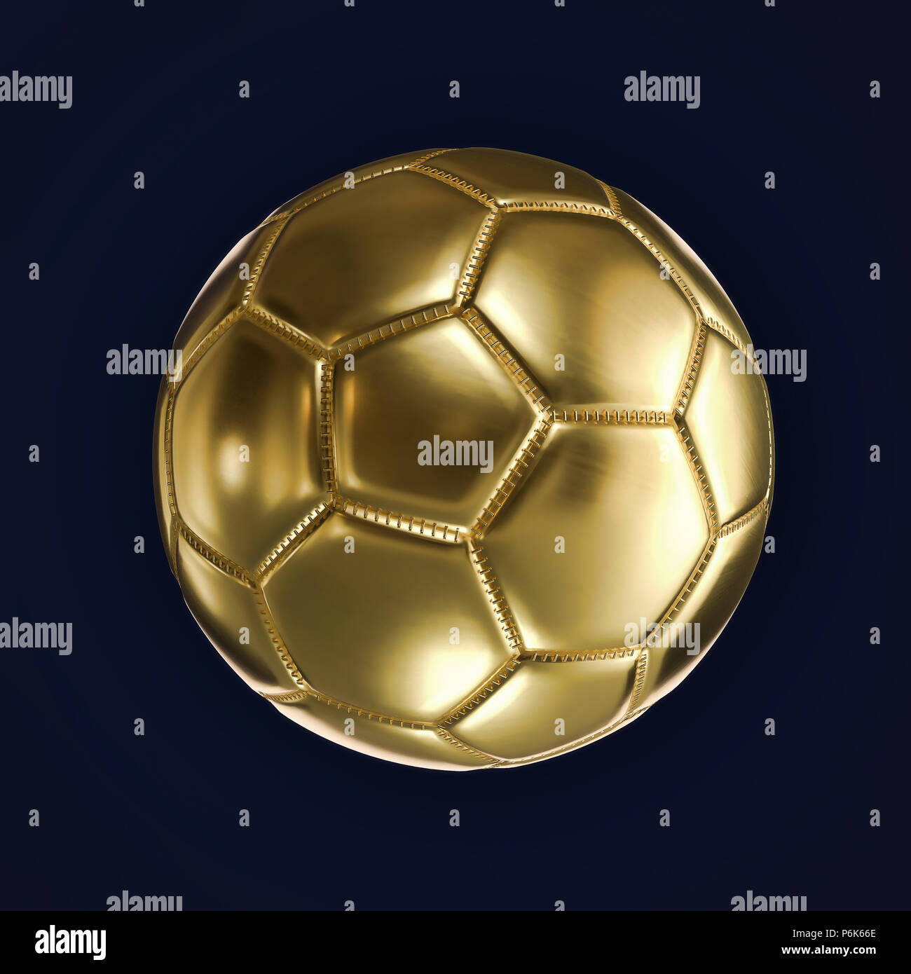 Ballon de soccer d'or sur fond bleu foncé Banque D'Images