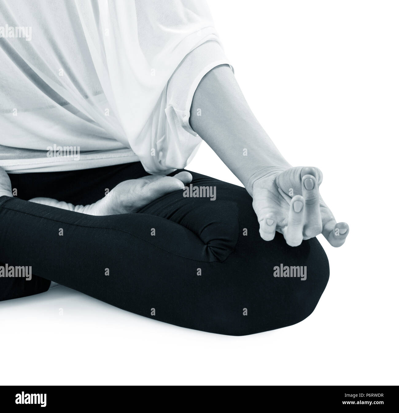 Image main de femme libre de tourné sur assis in yoga position Banque D'Images