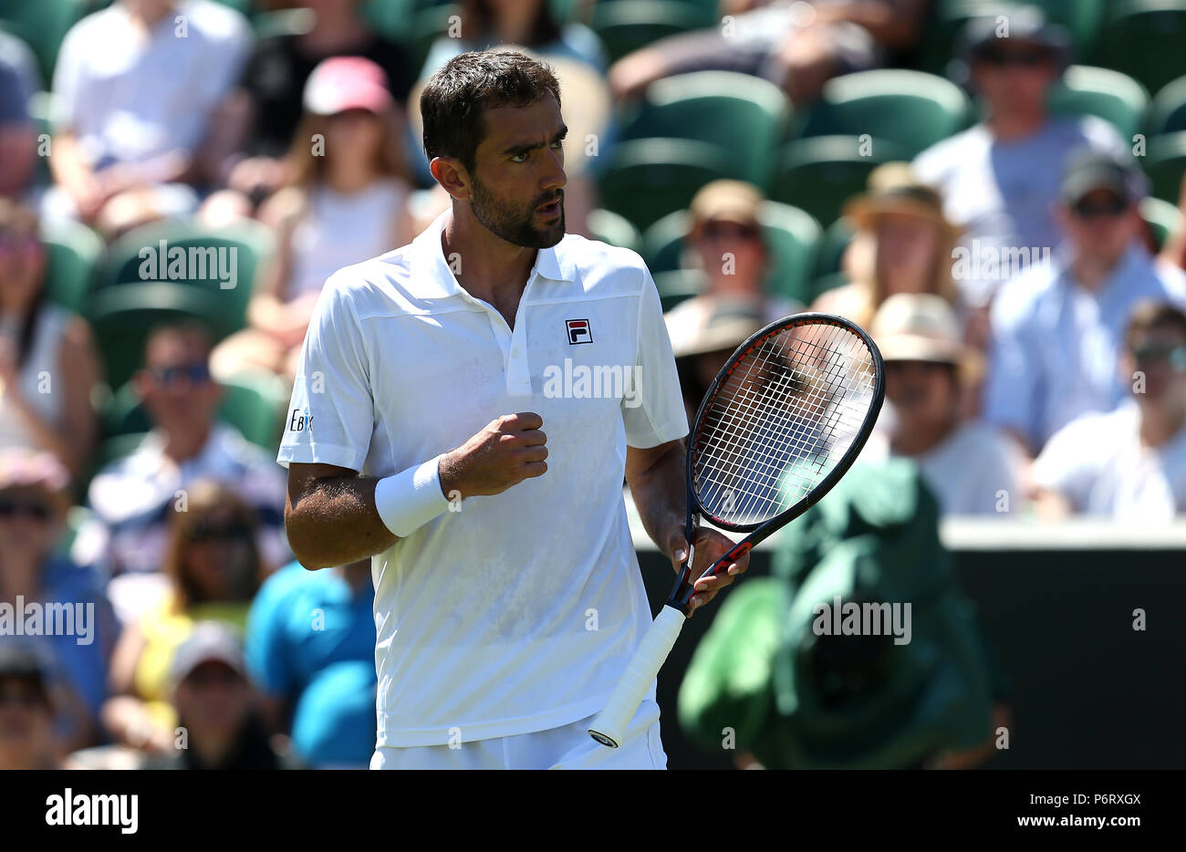 Marin Cilic réagit le premier jour des championnats de Wimbledon au All England Lawn tennis and Croquet Club, Wimbledon. APPUYEZ SUR ASSOCIATION photo. Date de la photo: Lundi 2 juillet 2018. Voir PA Story TENNIS Wimbledon. Le crédit photo doit être lu : Jonathan Brady/PA Wire. Banque D'Images