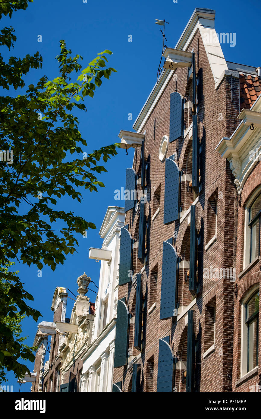 Façades des entrepôts du 18ème siècle converti en propriétés résidentielles, Amsterdam, Pays-Bas Banque D'Images