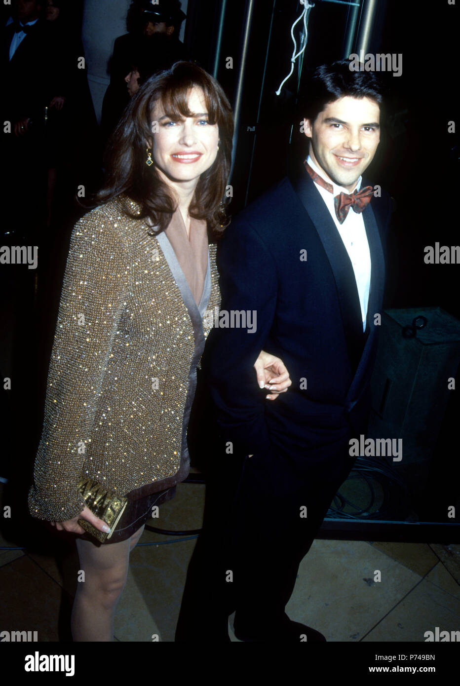 Los Angeles, CA - le 18 janvier : (L-R) L'actrice Mimi Rogers et mari producteur Chris Ciaffa assister à la 49e Assemblée Golden Globe Awards le 18 janvier 1992 au Beverly Hilton Hotel à Beverly Hills, Californie. Photo de Barry King/Alamy Stock Photo Banque D'Images