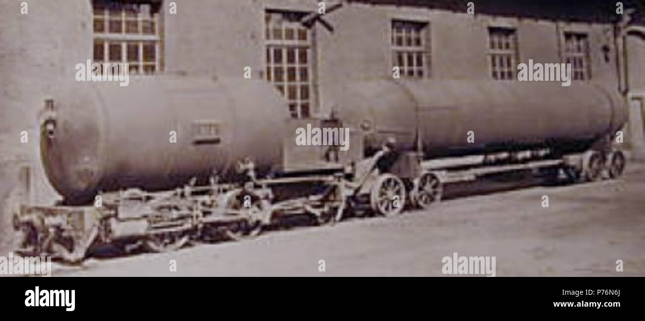 Anglais : l'image montre une locomotive pneumatique utilisé dans la construction de tunnel ferroviaire du Gothard et d'autres tunnels du Gotthardbahn et un chariot avec une pression supplémentaire contenant. L'énergie était stockée sous forme d'air comprimé dans les deux récipients de pression de la locomotive et de la remorque. L'expansion de parution a été utilisé de l'air pour faire fonctionner le moteur de la locomotive. Compresseurs de vapeur étaient facilement accessibles et par exemple en usage à conduire des marteaux piqueurs. Très probablement ces compresseurs ont été également utilisés pour charger les conteneurs sous pression à l'extérieur du tunnel. (La première Banque D'Images
