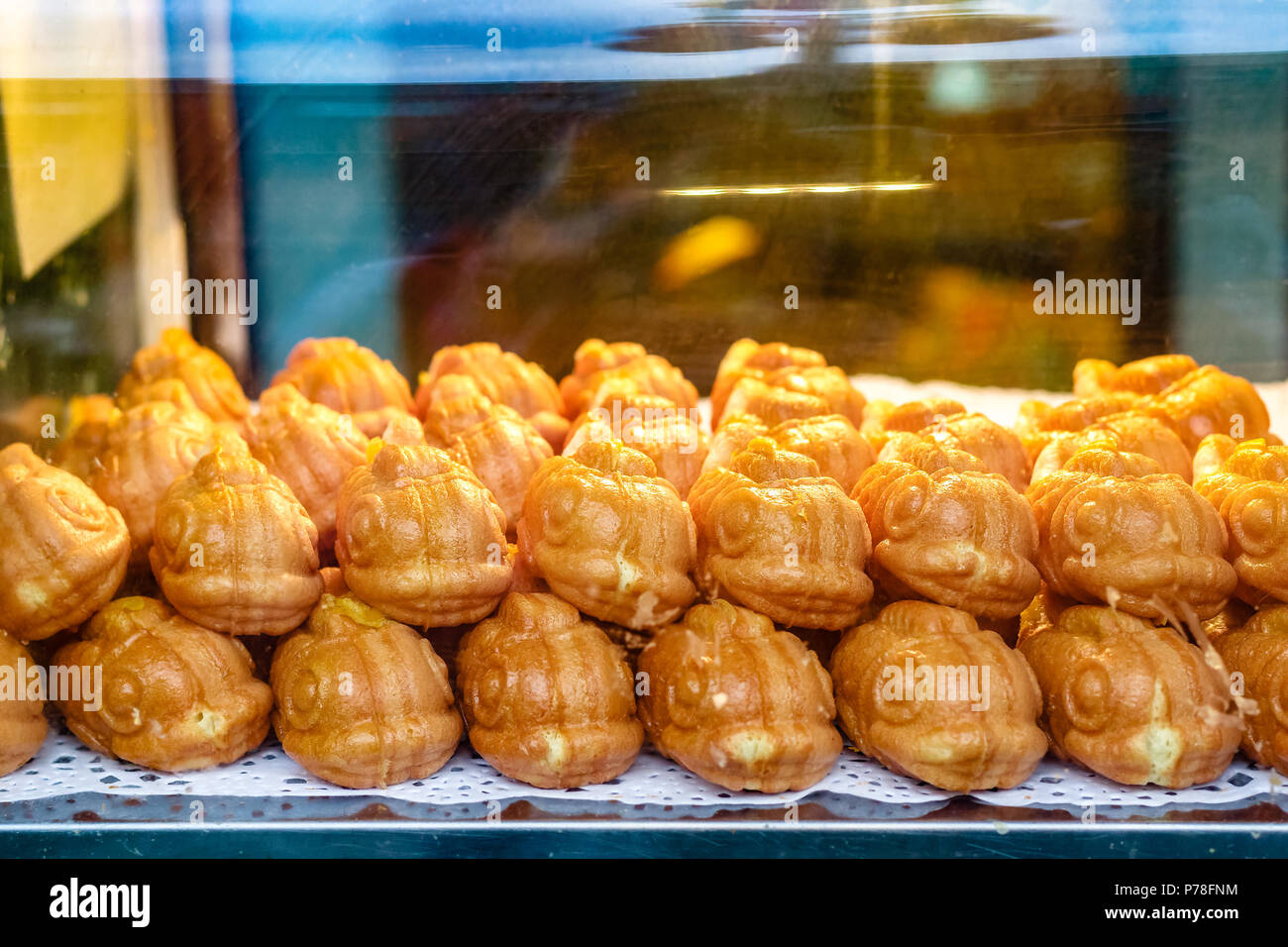 Taiyaki, gâteau en forme de poissons japonais sur l'affichage dans le quartier chinois de Londres Banque D'Images