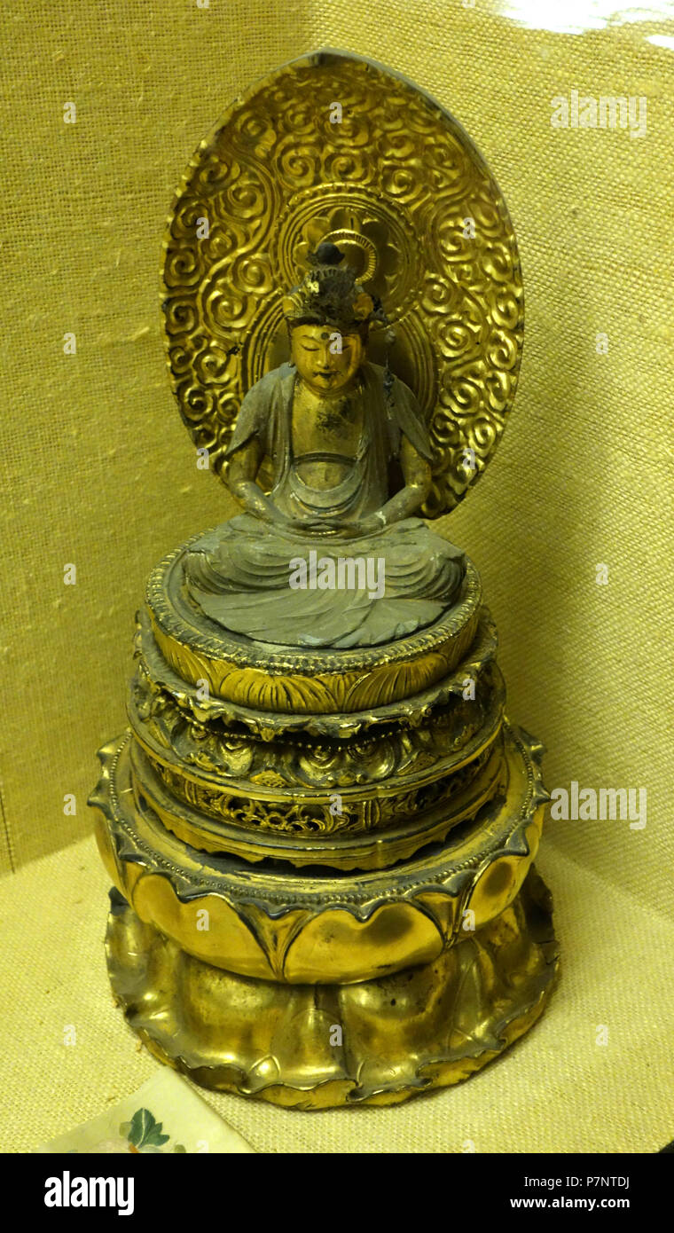 Anglais : Exposition dans le Musée Fairbanks et Planétarium, Huntsville, Alabama, USA. Cette oeuvre est assez vieux pour qu'il soit dans le . La photographie était permise dans le musée sans restriction. 18 août 2013, 13:24:14 Bouddha 56 - Fairbanks Museum et Planétarium - DSC04372 Banque D'Images