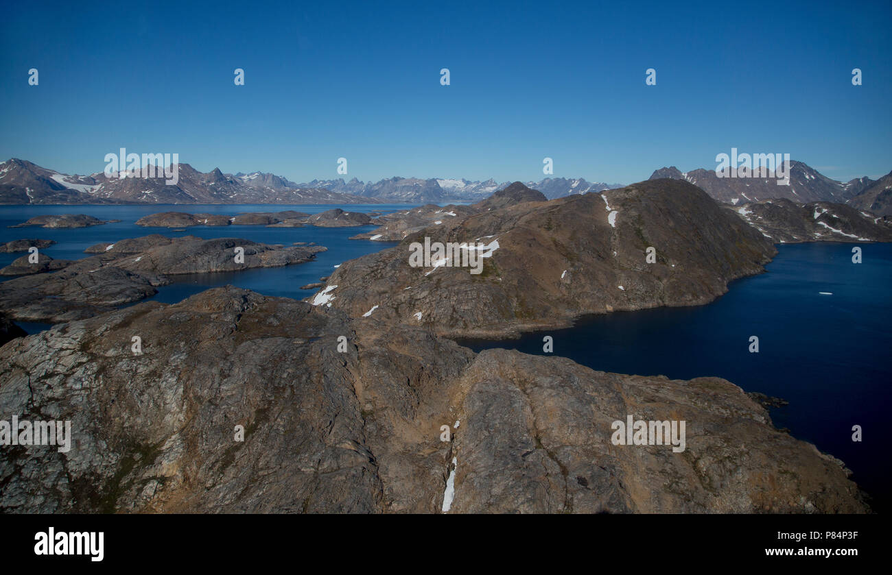 Vue sur les fjords, vol de l'aéroport de Kulusuk au canton de l'Est du Groenland dans Tasiilag Banque D'Images
