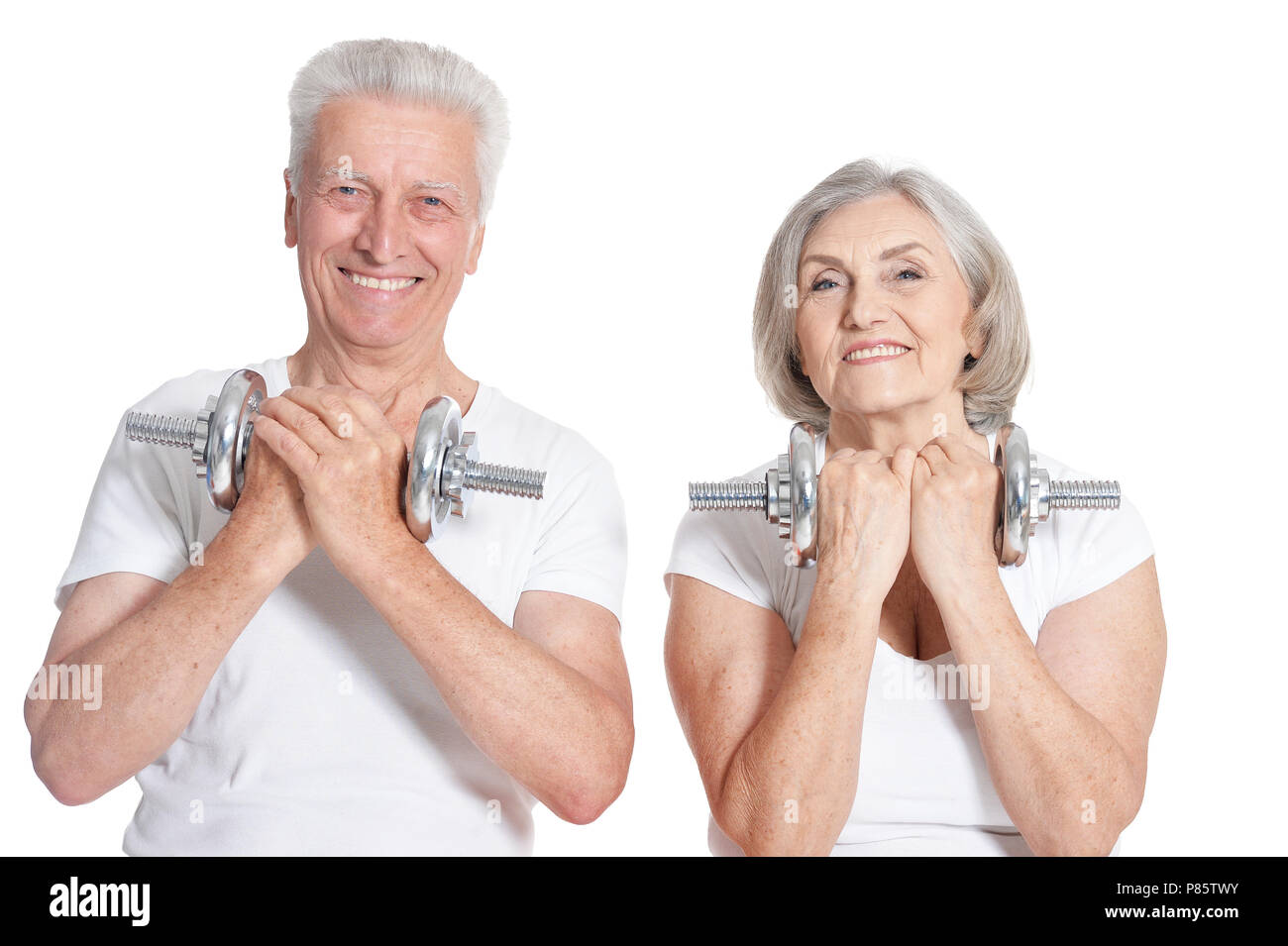 Smiling senior couple exercising Banque D'Images