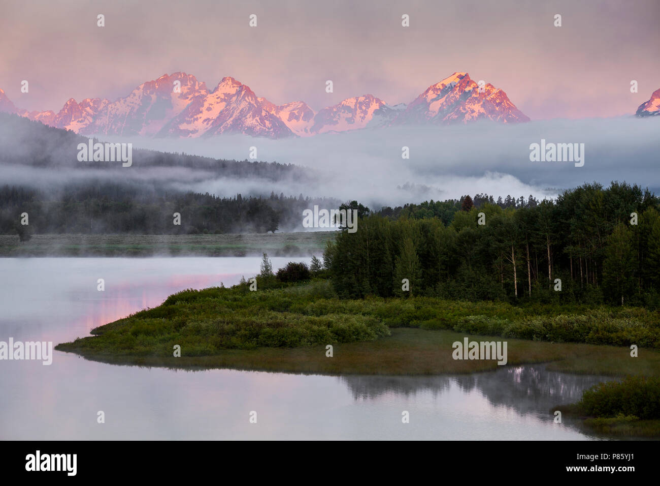WY02781-00...WYOMING - Lever du Soleil à l'Oxbow Bend de la Snake River dans le Grand Teton National Park. Banque D'Images