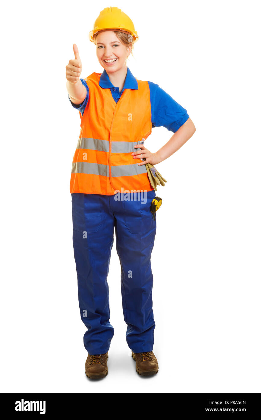 Jeune femme en tant que constructeur de routes avec casque et gilet de sécurité tient son pouce vers le haut Banque D'Images