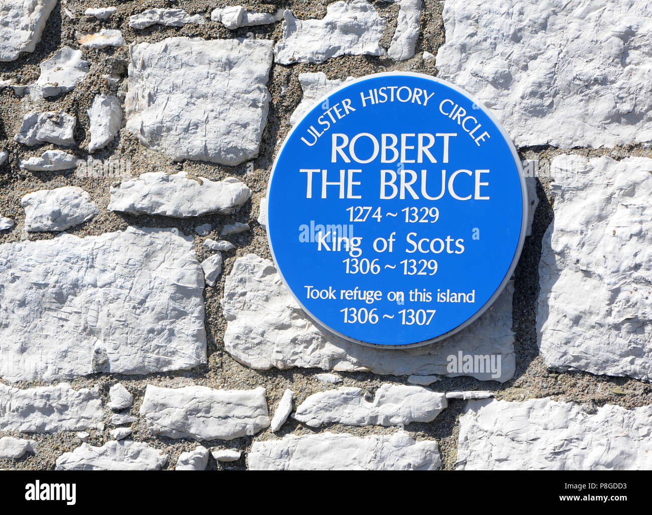 Blue plaque commémorant le roi Robert Bruce le séjour sur l'île de Rathlin dans le quatorzième siècle, quand il avait sa fameuse rencontre avec une araignée. Rat Banque D'Images