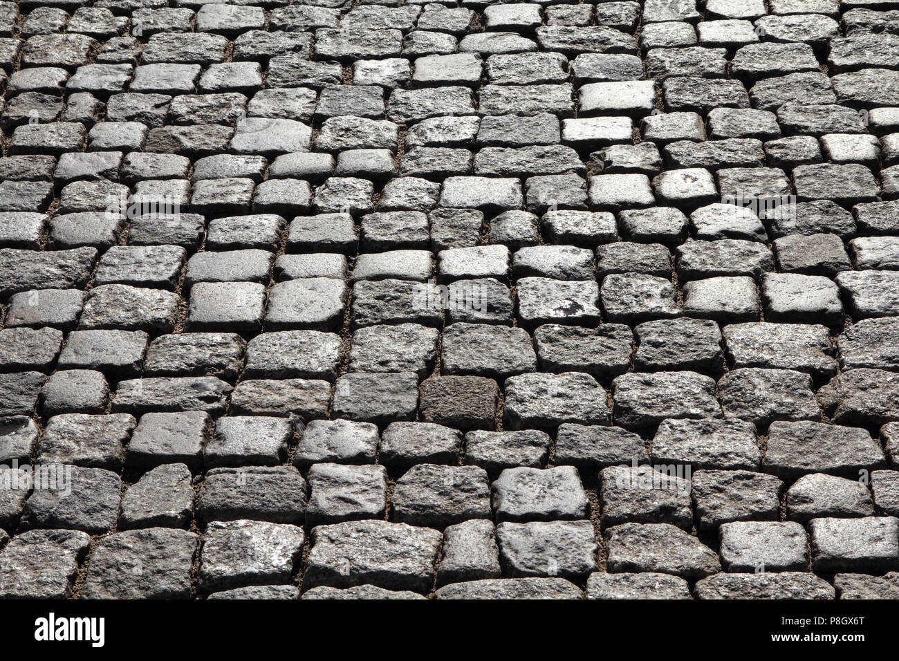 Texture de fond de galets. Rue pavée, à Gdansk, Pologne. Banque D'Images
