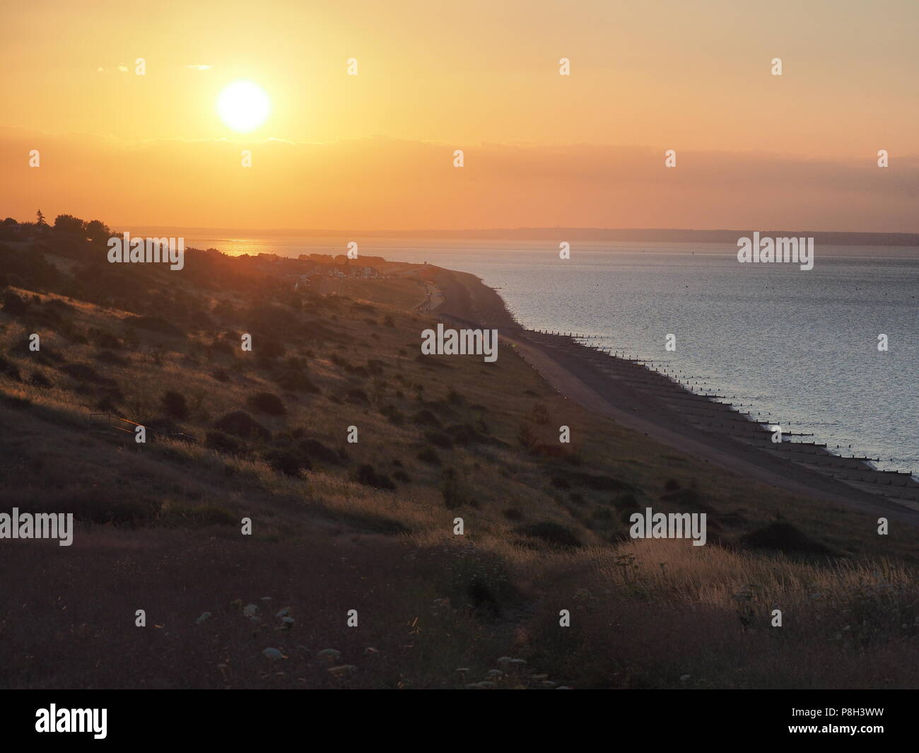 Minster sur mer, Kent, UK. 11 juillet, 2018. Météo France : cette soirée coucher du soleil à Minster sur mer, Kent. Credit : James Bell/Alamy Live News Banque D'Images