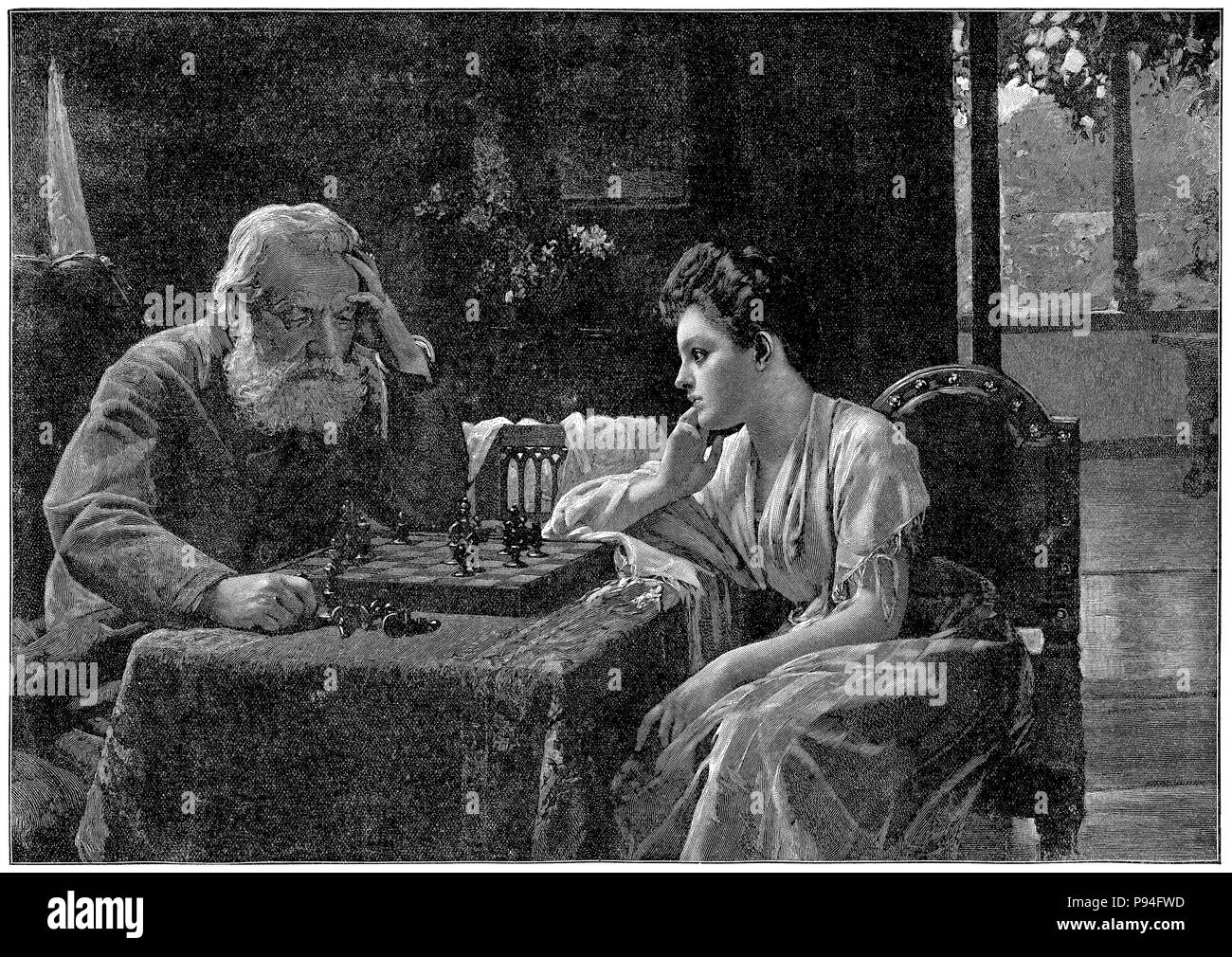 1903 gravure 'vintage', d'une absorption complète montrant deux joueurs d'échecs. À partir de la Girl's Own Paper, 21 novembre 1903. Banque D'Images