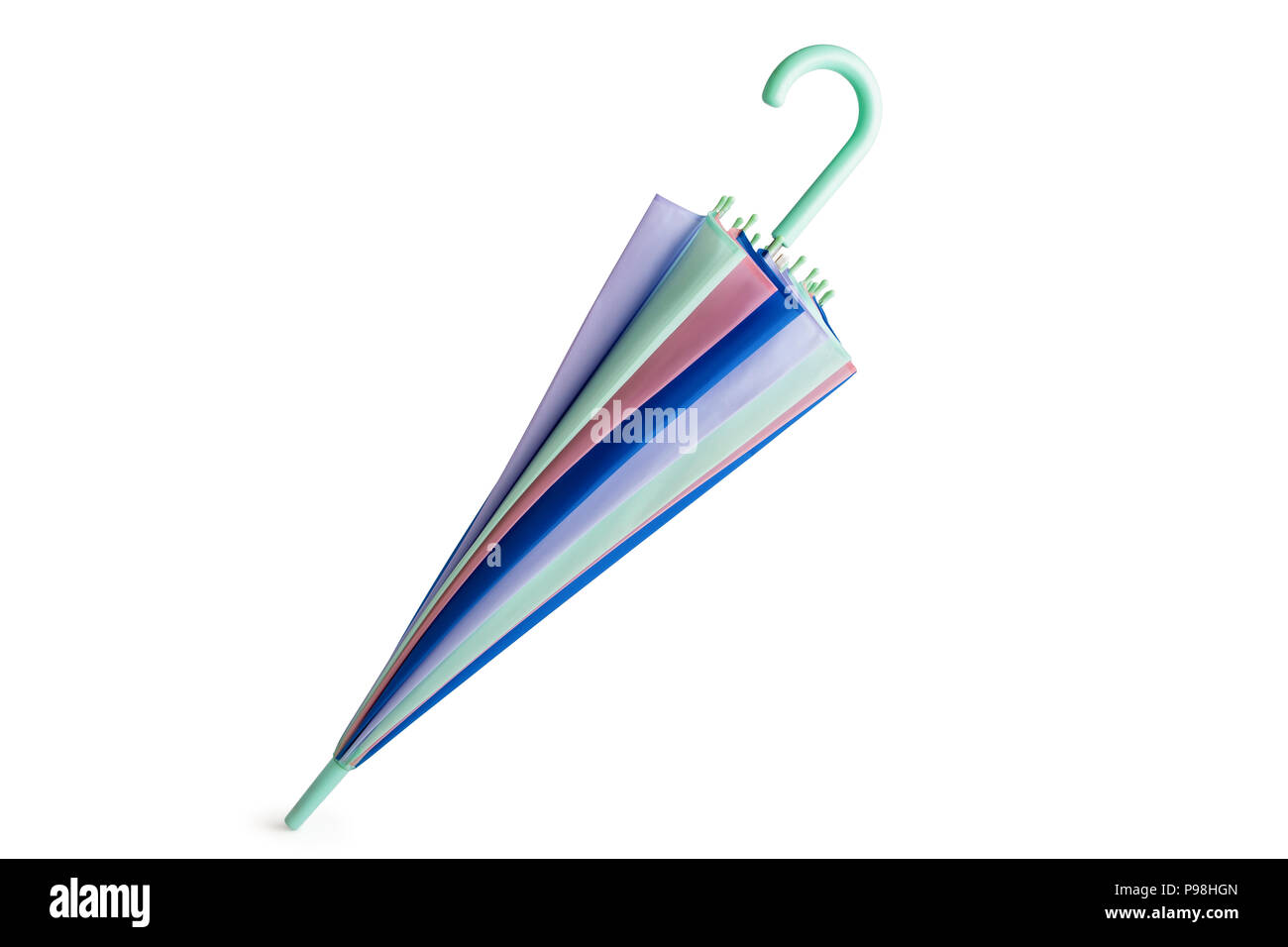 Parapluie de couleur pastel isolé sur fond blanc. Banque D'Images