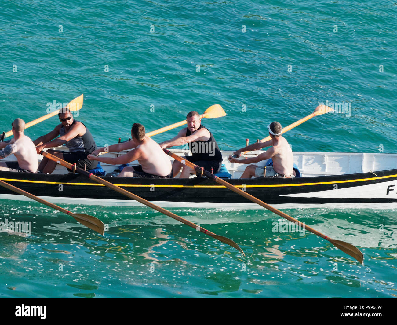 Pilote traditionnel Concert concours d'aviron pour Atkinson,Trophée de la rivière Gannel à Port de Newquay, Royaume-Uni, Juillet 14th, 2018 Robert Taylor/Alamy Live News. Newquay, Banque D'Images